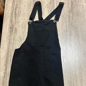 A black overall dress from Wild Fable